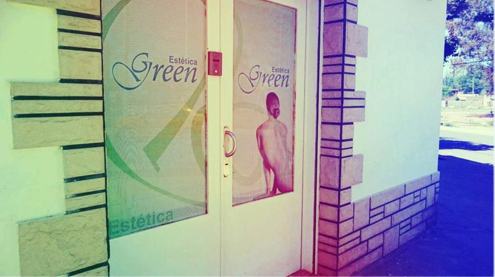 Close-up luxurious aesthetic facial skincare treatment in progress inside a serene clinic. Aesthetician with soft gloves delicately applying hydration serum or mask on a relaxed female client's skin. Warm soft lighting, clean botanical atmosphere, eucalyptus and natural spa aesthetic, high-end beauty salon photography.